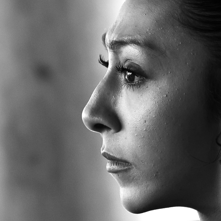black and white face image of the face of a flamenco dancer in profile