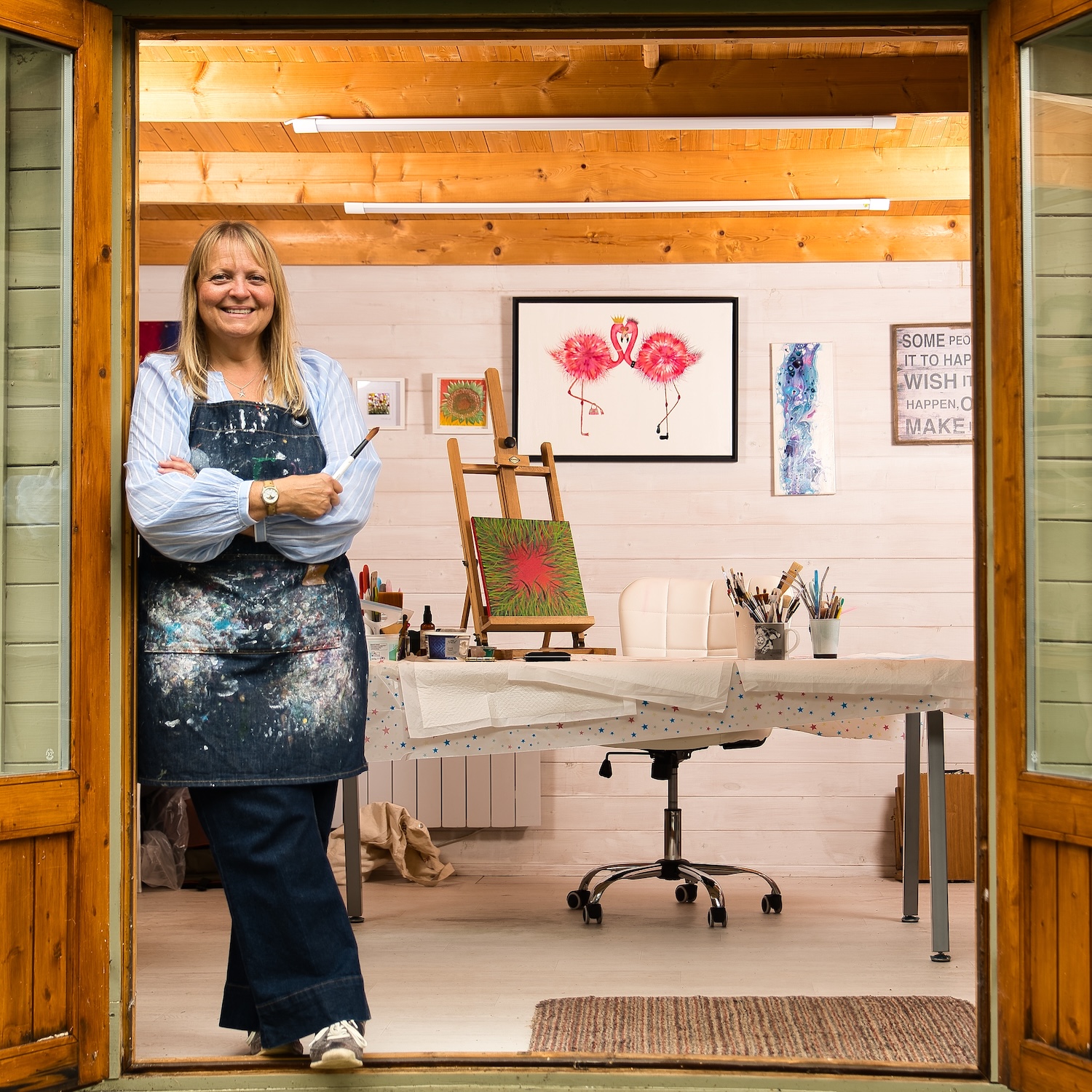 colour image of a woman  in her art studio