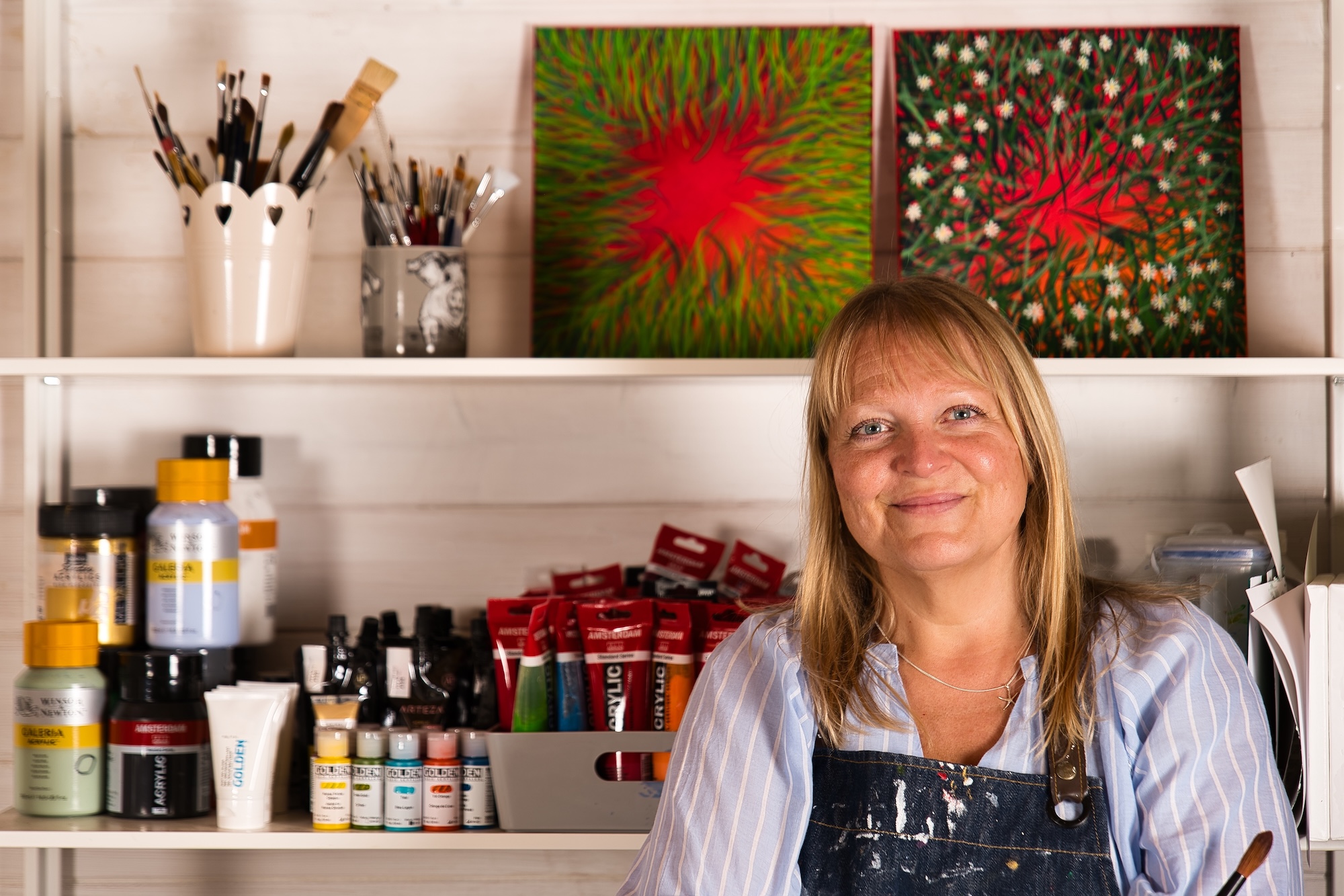 colour image of a woman in her art studio