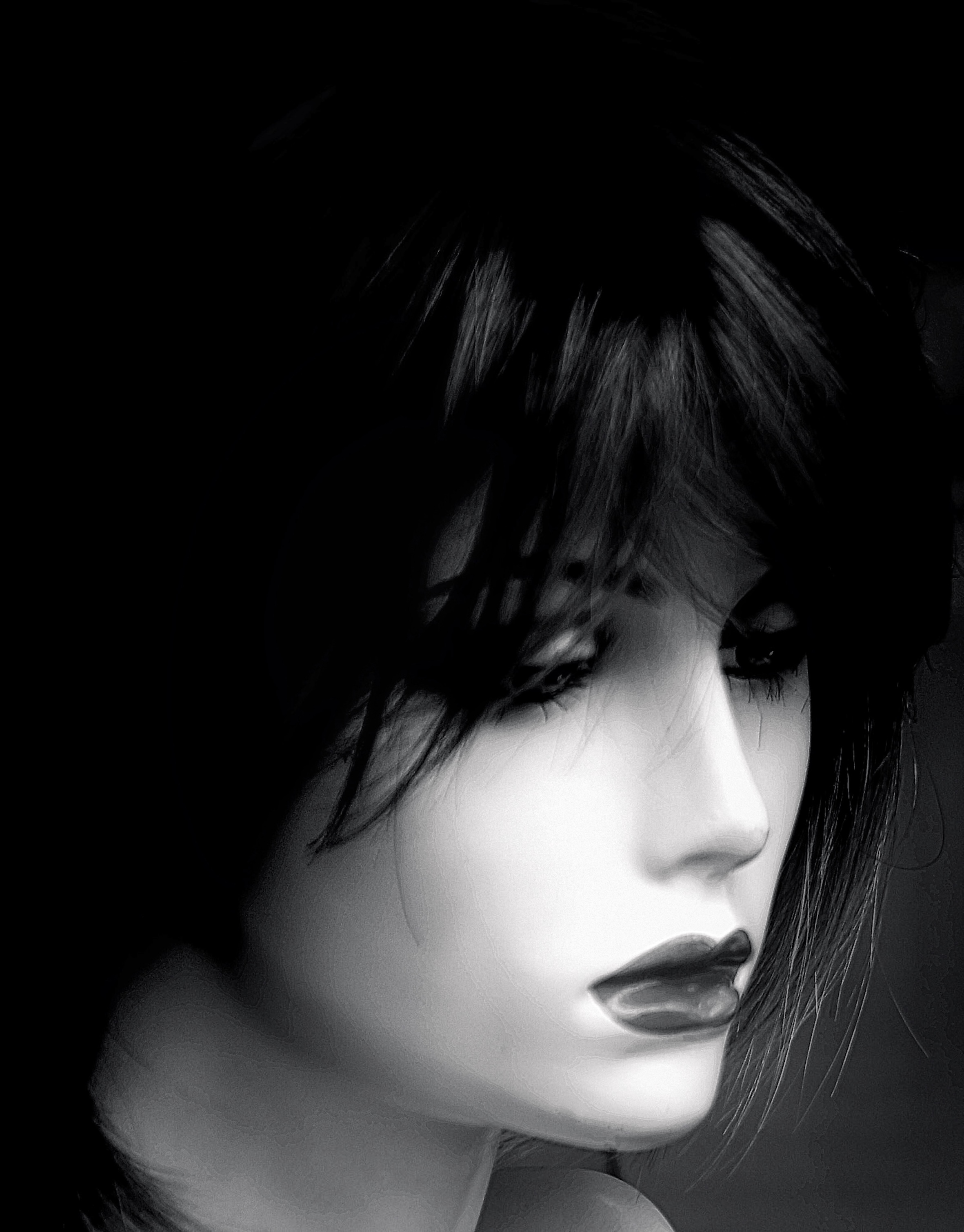demure mannquin lokking down in black and white