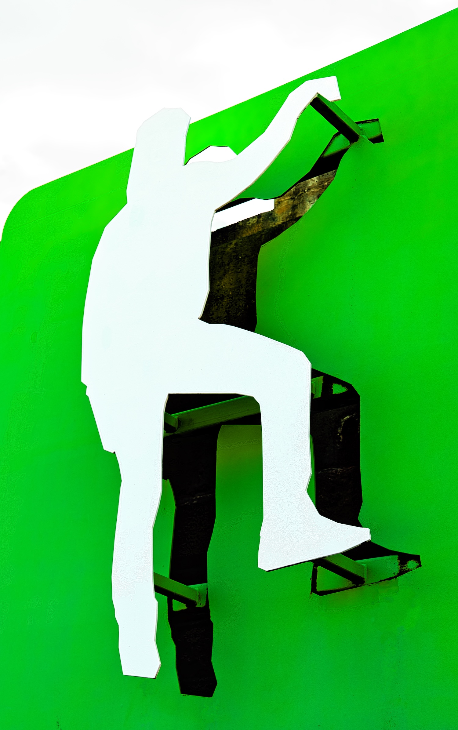 the climbing Man as the K in Folkestone sign on the hrbour wall