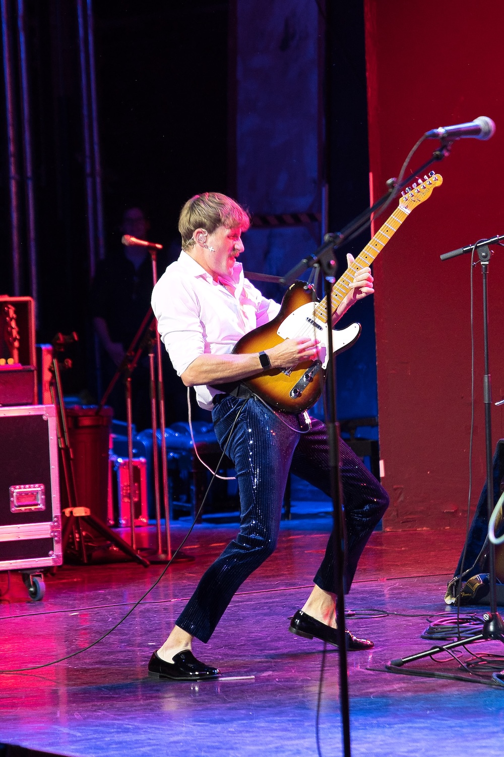 Chrystal Tides guitarist playing on stage